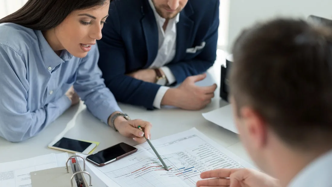 LBS consultants in discussion with a client